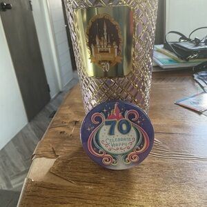 NEW STARBUCKS DISNEYLAND (2025 70TH
ANNIVERSARY PINK & SILVER COFFEE 
TUMBLER